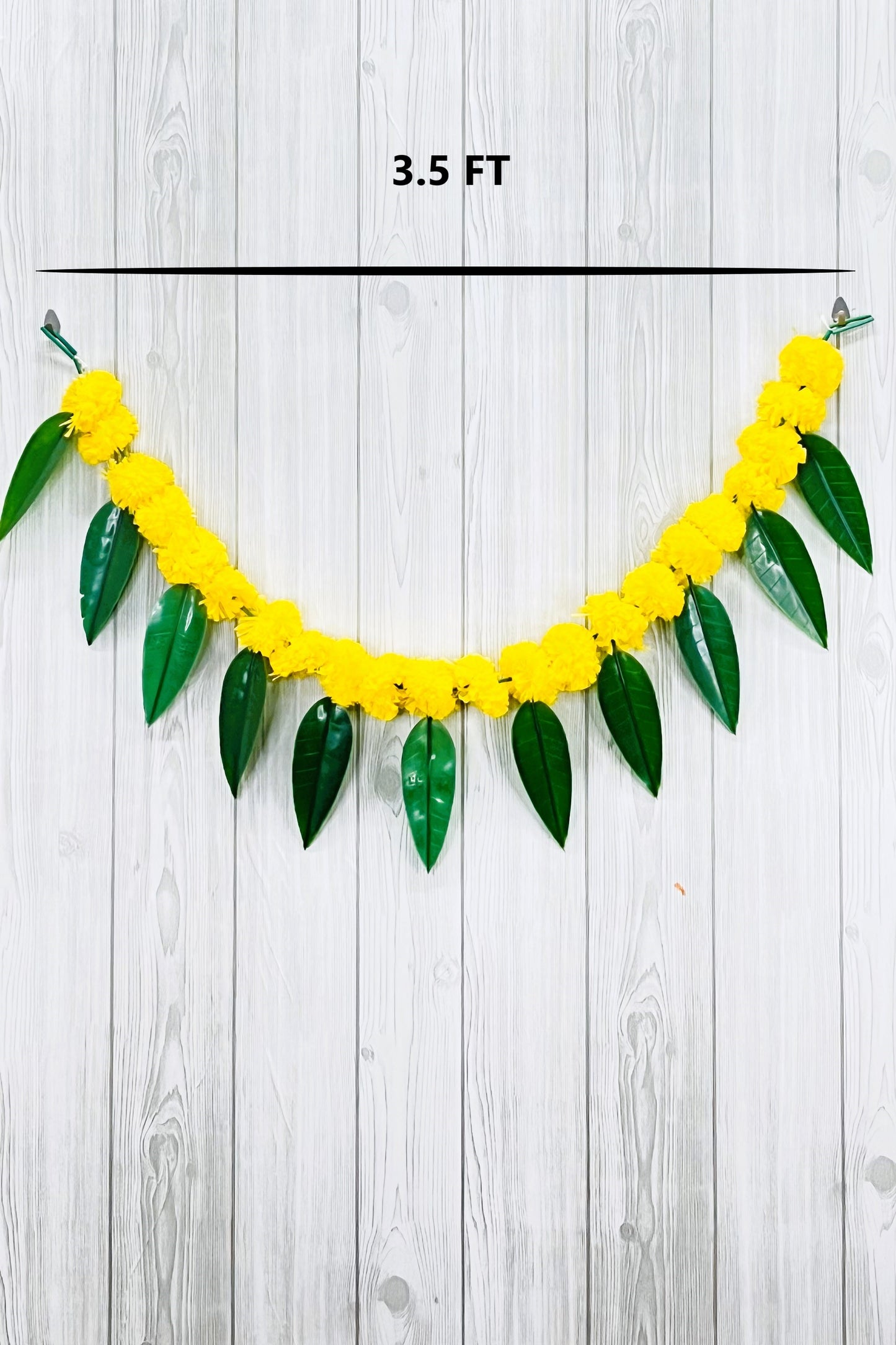 Akaar Festive Bandhanwar in marigold with mango leaves