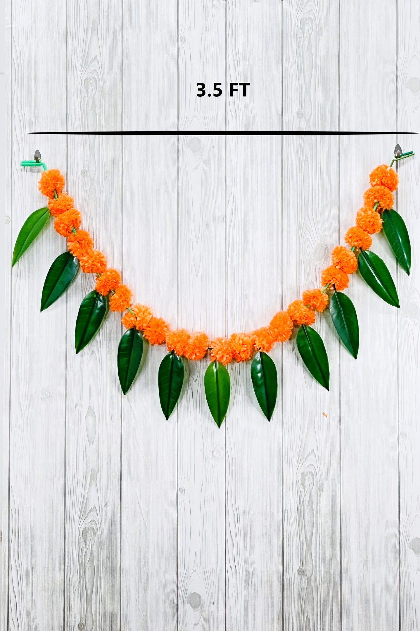 Akaar Festive Bandhanwar in marigold with mango leaves