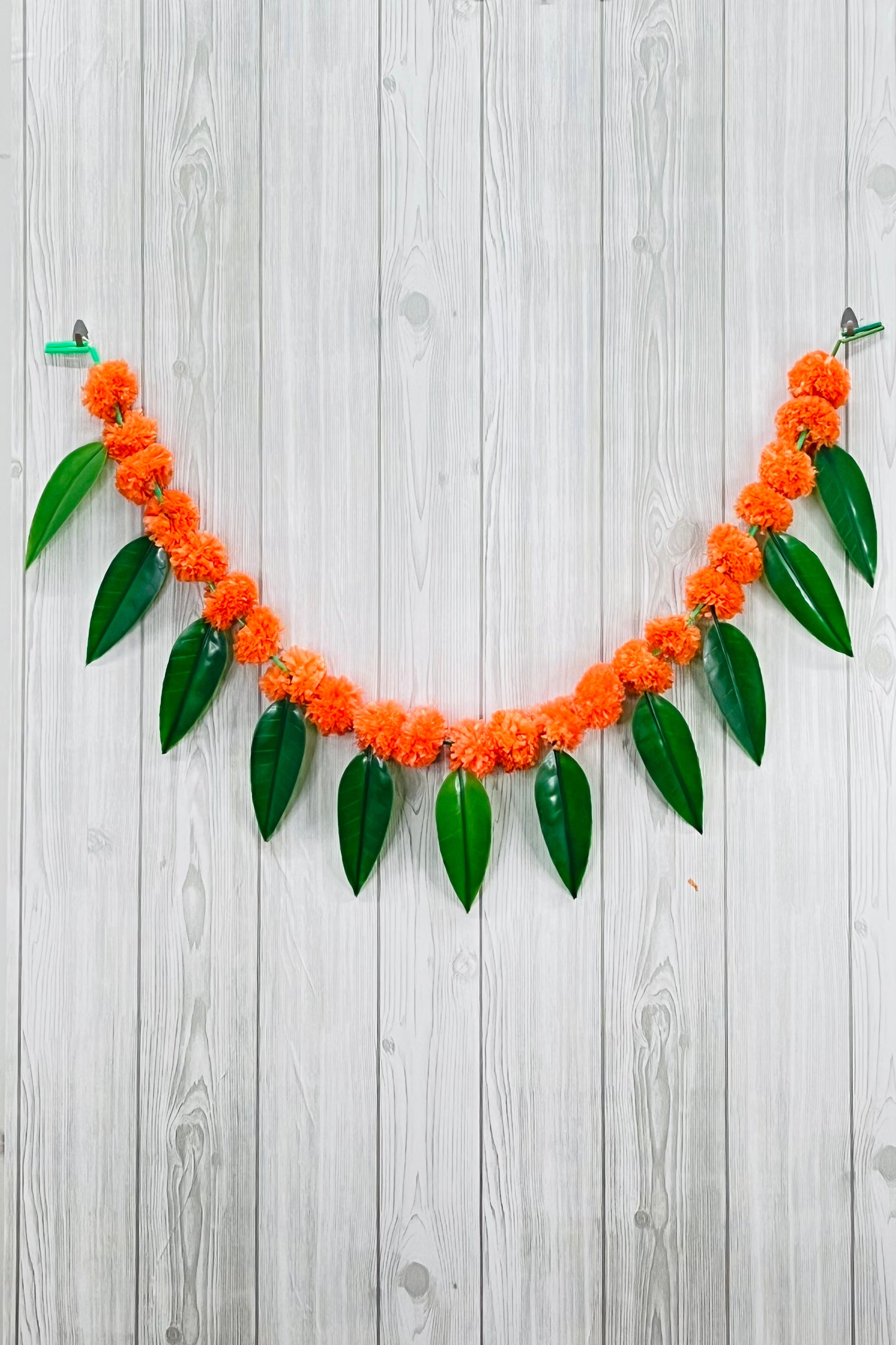 Akaar Festive Bandhanwar in marigold with mango leaves