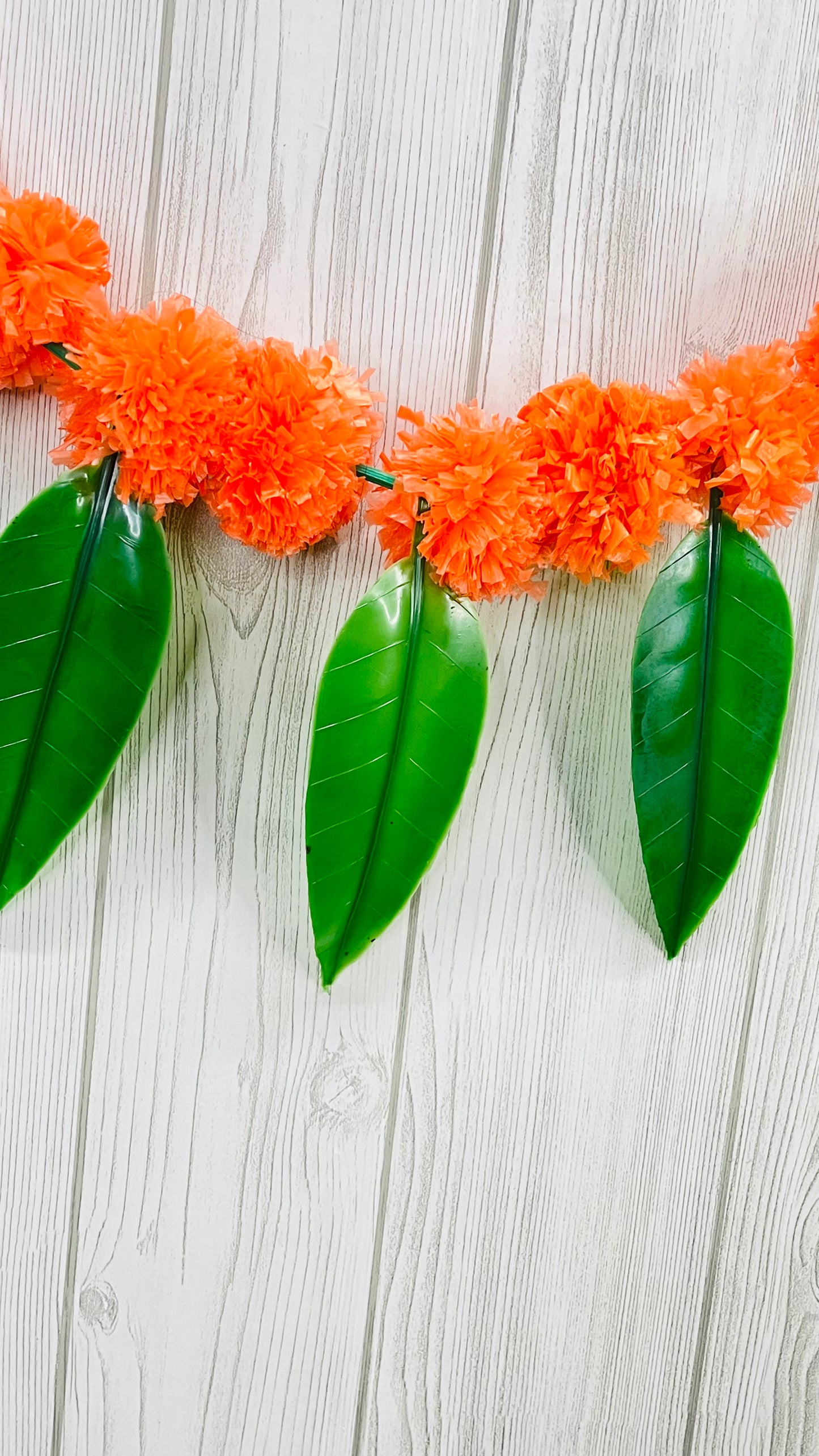 Akaar Festive Bandhanwar in marigold with mango leaves