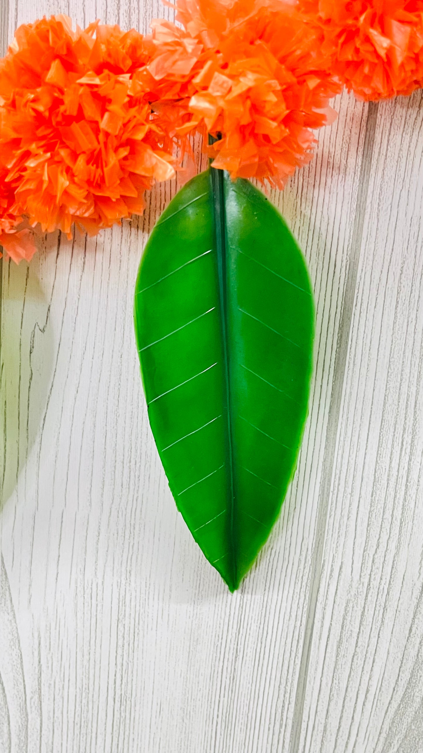 Akaar Festive Bandhanwar in marigold with mango leaves
