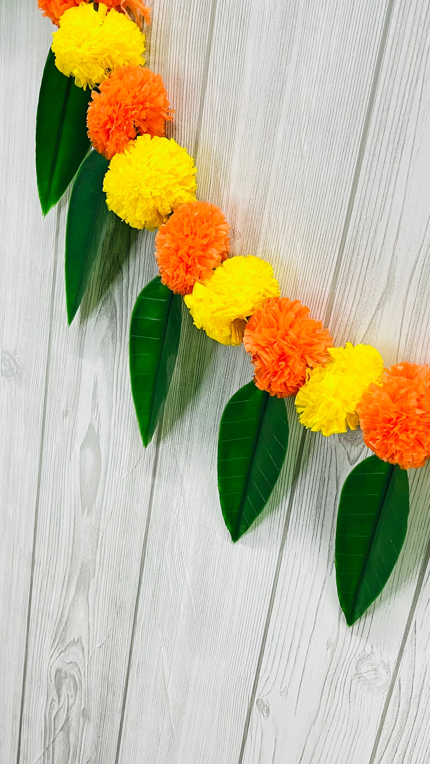 Akaar Festive Bandhanwar in marigold with mango leaves