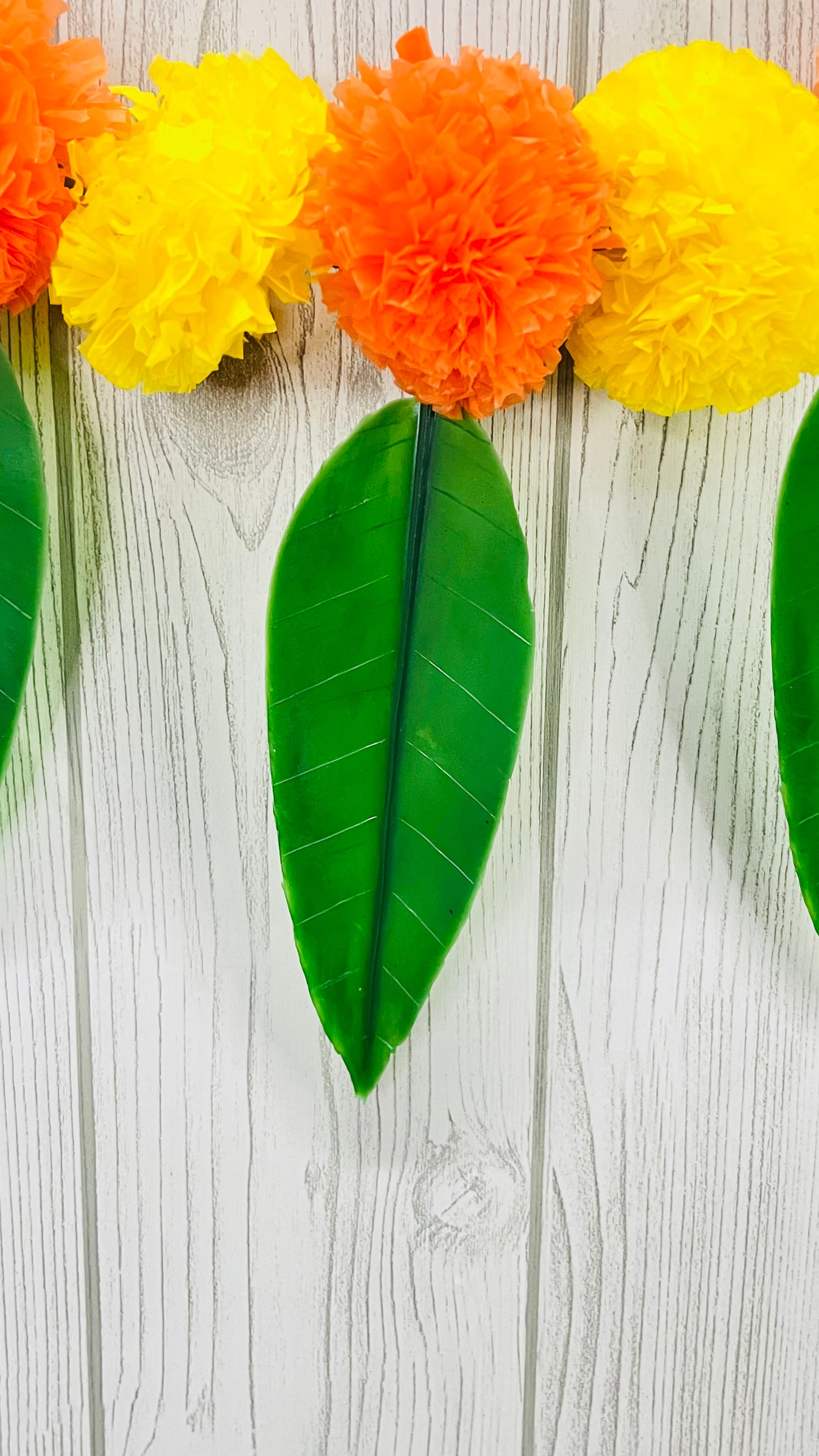 Akaar Festive Bandhanwar in marigold with mango leaves