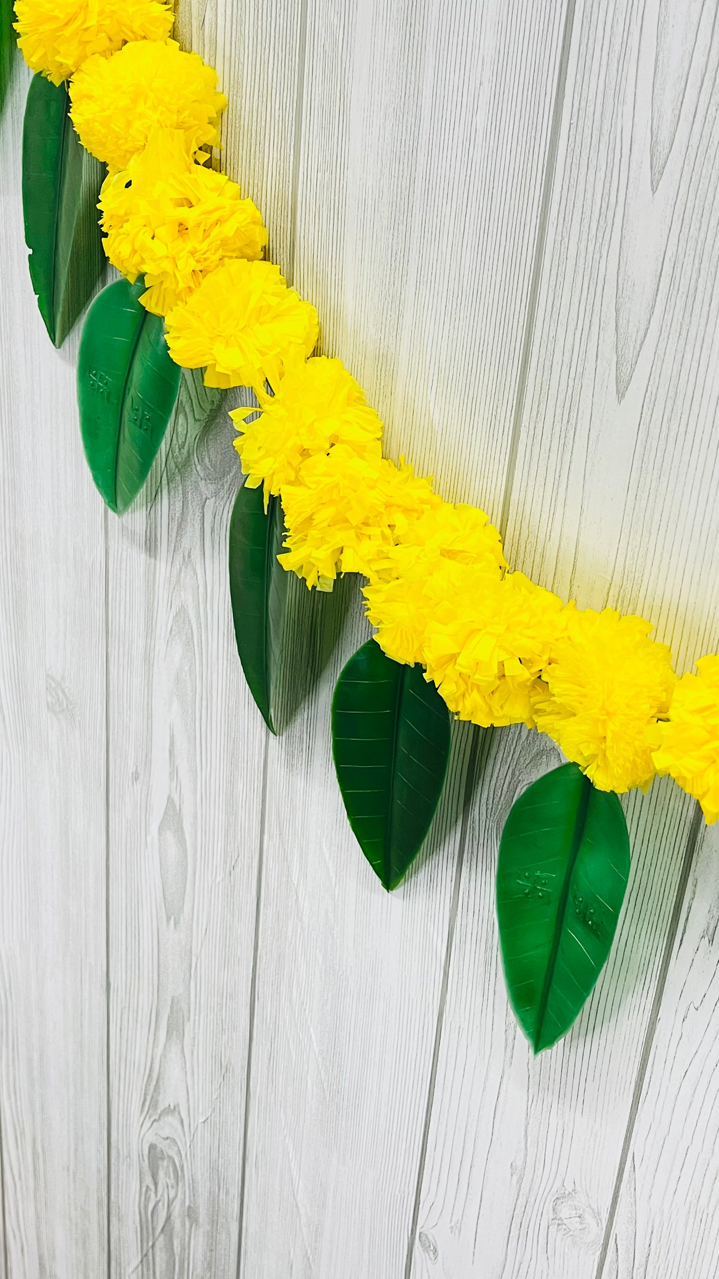 Akaar Festive Bandhanwar in marigold with mango leaves