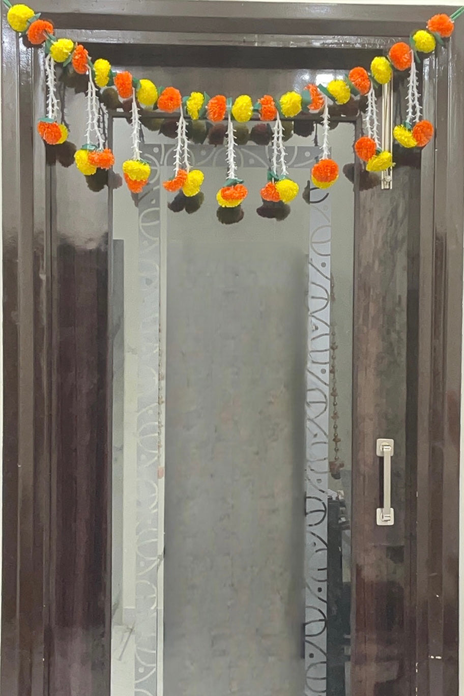 Akaar Festive Bandhanwar in marigold and rajnigandha jhumki