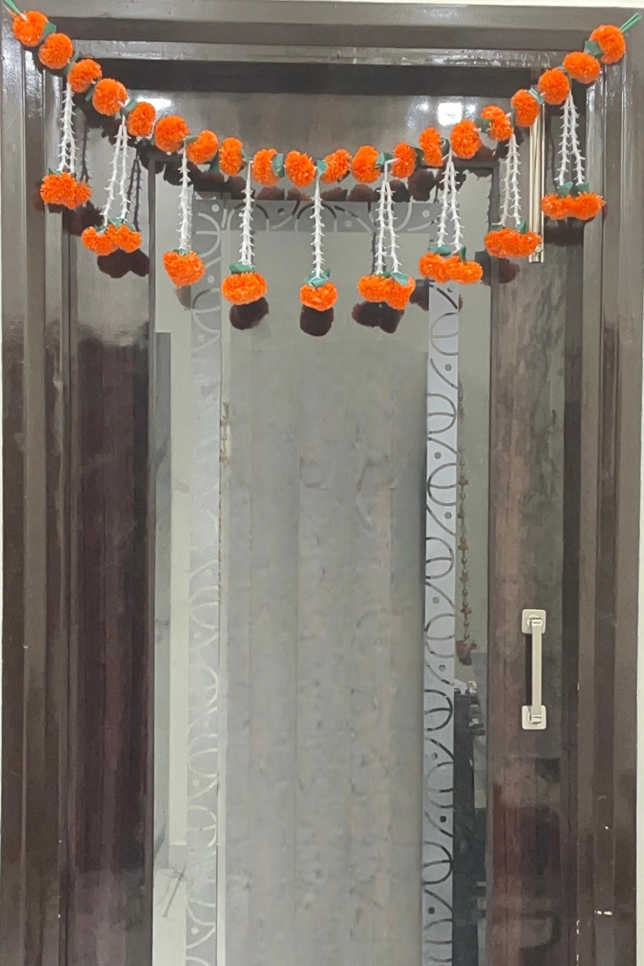 Akaar Festive Bandhanwar in marigold and rajnigandha jhumki