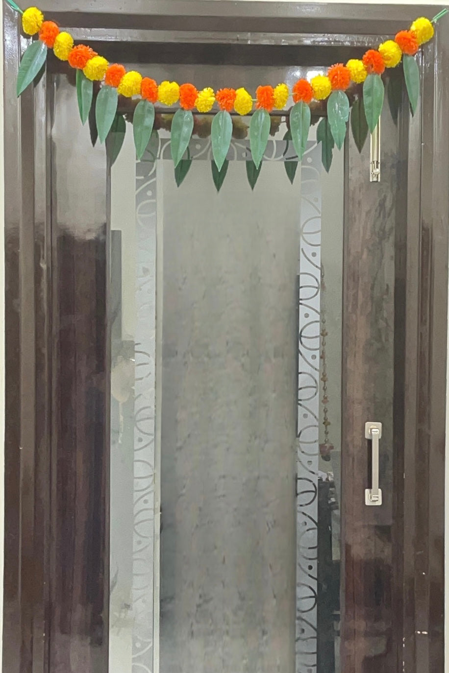 Akaar Festive Bandhanwar in marigold with mango leaves