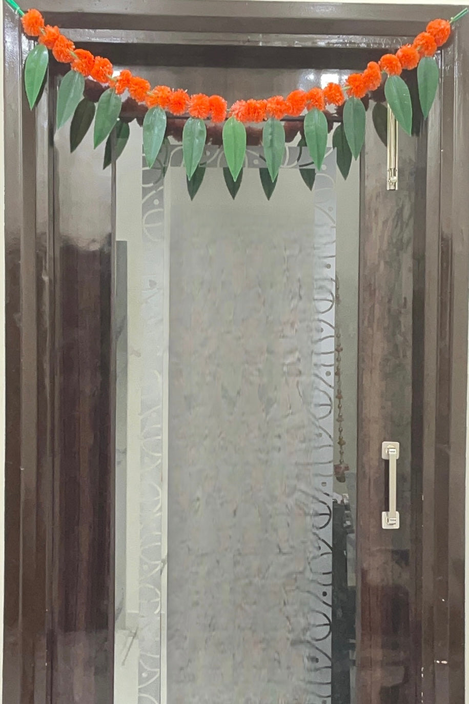 Akaar Festive Bandhanwar in marigold with mango leaves