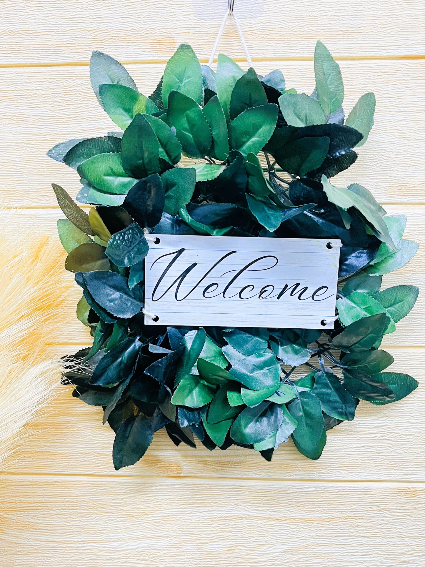 Akaar Welcome Signage in Green Leaves