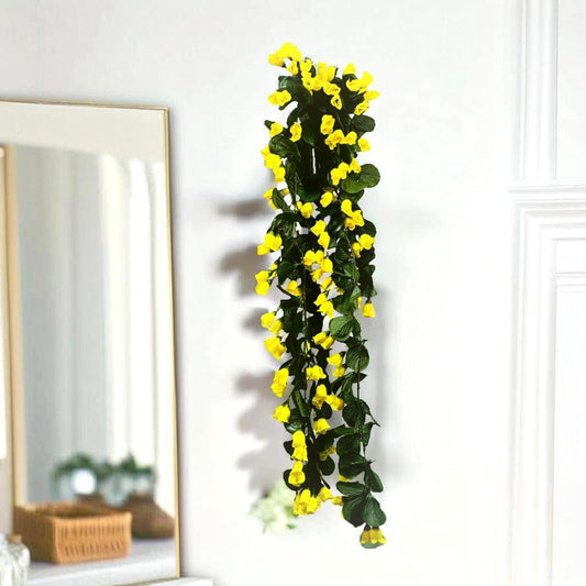 Akaar Rose Bud Falling in Yellow