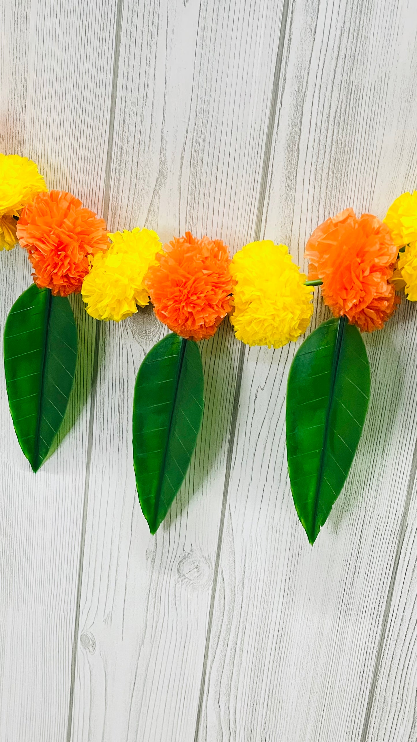 Akaar Festive Bandhanwar in marigold with mango leaves